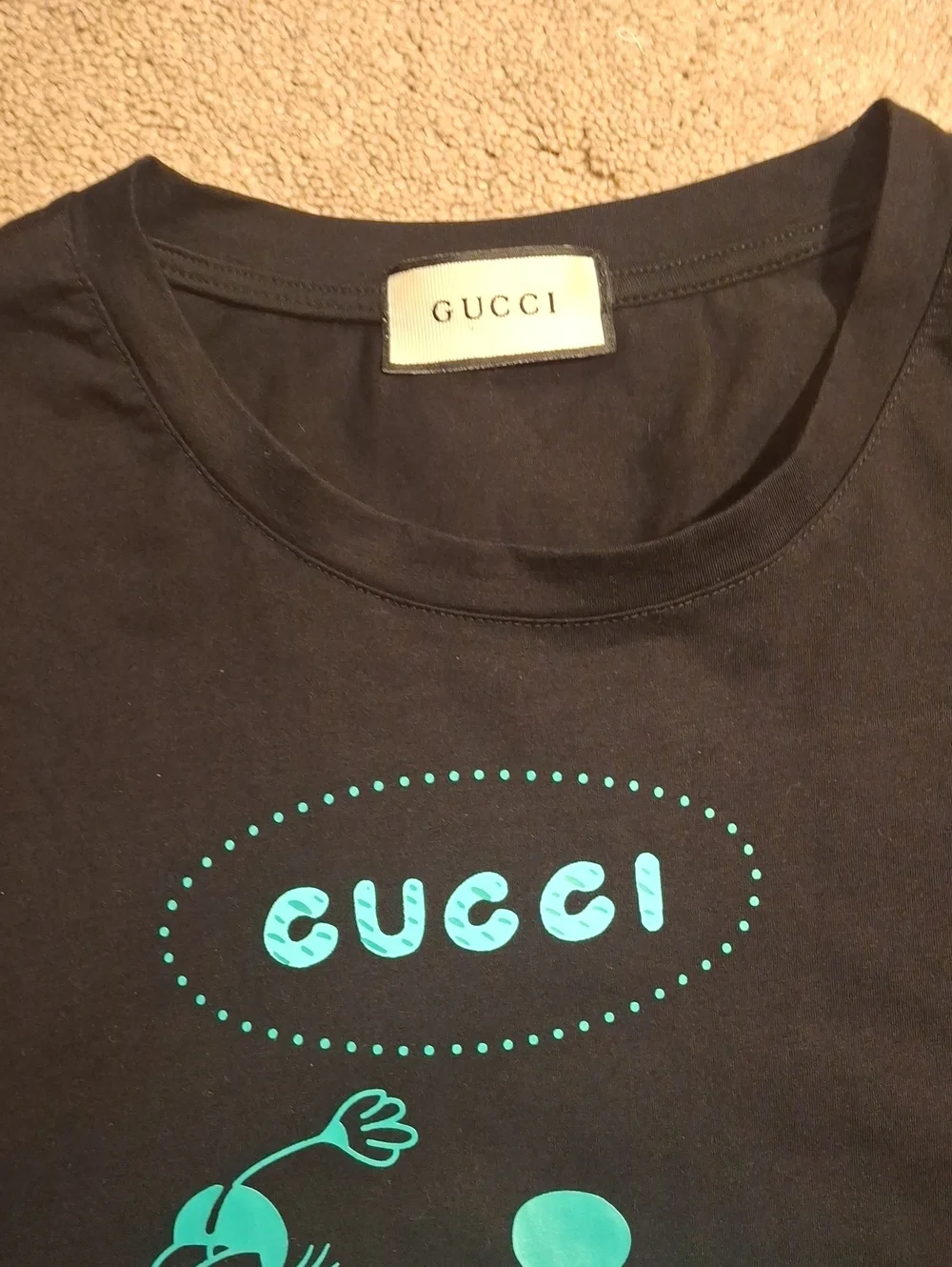 Gucci Black Tee with Teal Logo Graphic